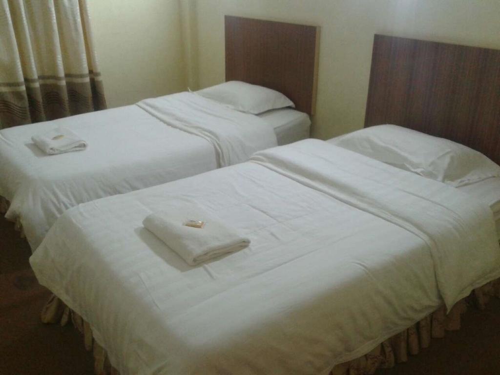 The Garden Inn Мири Стая снимка