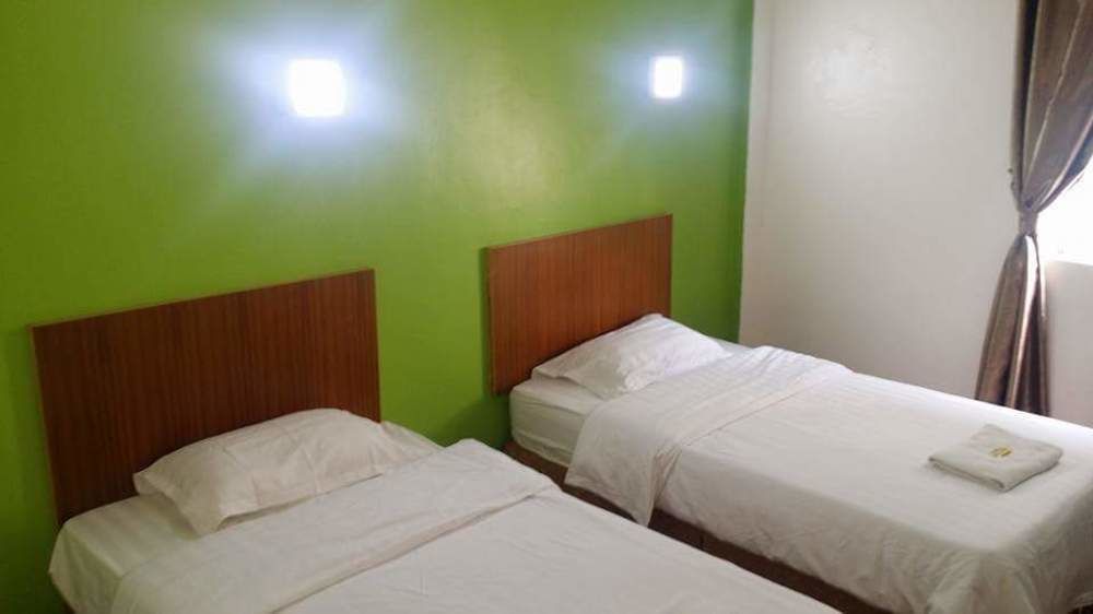 The Garden Inn Мири Екстериор снимка